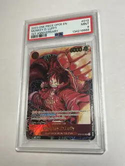 One Piece OP05 Monkey D. Luffy 1st Anniversary ST01-012 PSA 9 *Minor Scratch - Image 1