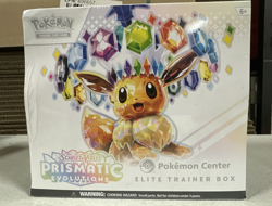 Prismatic Evolutions POKEMON CENTER ETB SEALED (Slight bend/rip) - Image 1