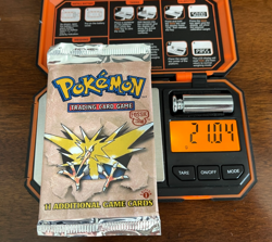 1999 Pokemon 1st Edition Fossil Booster Pack Factory sealed ZAPDOS 21 grams - Image 5