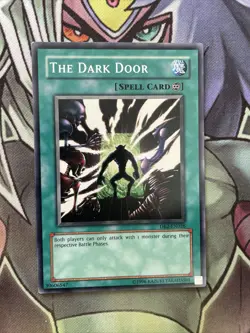 DB2-EN026 The Dark Door Common Unlimited Edition NM Yugioh Card - Image 1