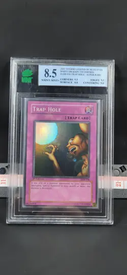 Yu-Gi-Oh Trap Hole LOB-058 1st Edition Super Rare MNT 8.5 NM-MT+ - Image 1