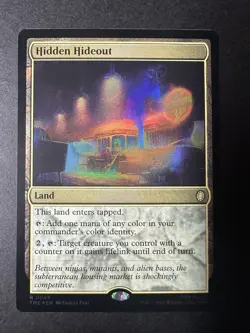 Hidden Hideout (Surge Foil) Commander: Teenage Mutant Ninja Turtles Foil - Image 1