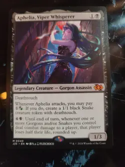 MTG Aphelia, Viper Whisperer (Anime) [Foundations Jumpstart] Near Mint - Image 1