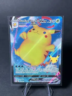 Pokemon TCG Surfing Pikachu VMAX 009/025 Celebrations 25th Anniversary - Image 1