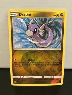 Dratini 147/236 Reverse Holo Common Pokemon Unified Minds - Image 1
