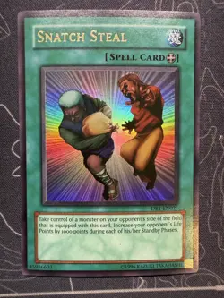 Yugioh Snatch Steal DB1-EN021 Unlimited Edition Ultra Rare NM/LP - Image 1