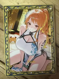 One Piece CCG Goddess Nami Metal Card - Straddling The Floor /50 - Image 1