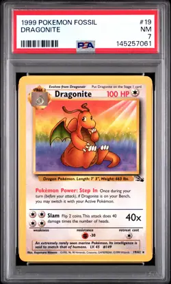1999 POKEMON FOSSIL #19 DRAGONITE PSA 7 - Image 1