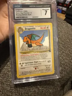 DRAGONITE 1999 POKEMON BLACK STAR PROMOS THE FIRST MOVIE #5 CGC 7 - Image 1