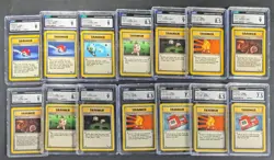 Lot of (14) 1999 Pokemon Assorted CGC Graded Trainer Cards w/ Poke Ball Pokedex - Image 1
