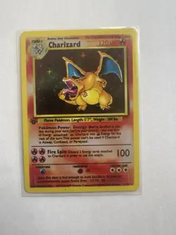 Pokemon TCG Charizard Base Set 4/102 Holo Rare 1999 Wizards Copyright Card - Image 1