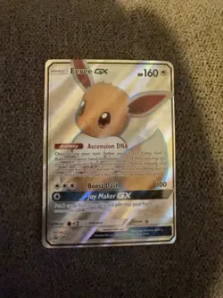 Pokemon Eevee GX TCG Full Art Holo Rare Black Star Promo Card SM242 - Image 1