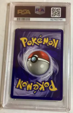 1999 POKEMON FOSSIL #19 DRAGONITE PSA 7 - Image 2