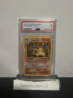 1999 Pokemon Game Base Set Unlimited Charizard Holo WOTC 4/102 PSA 7 NM - Image 1