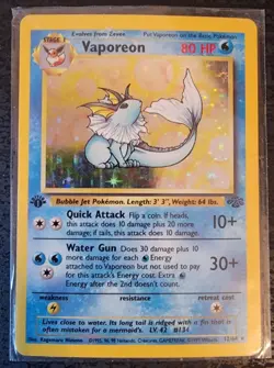 Pokemon Vaporeon 1st Edition Holo Rare Jungle 12/64 WoTC 1999 Raw LP - Image 1