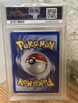 PSA 8 Rocket's Hitmonchan 11/132 Gym Heroes 1st Edition Holo Rare Pokemon TCG - Image 2