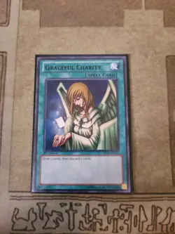 YUGIOH GRACEFUL CHARITY BP02-EN137 BLACK RARE 1ST ED NM - Image 1