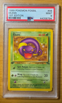 1999 Pokemon Fossil #46 Ekans 1st Edition PSA 9 - Image 1