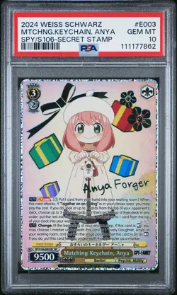 2024 WEISS SCHWARZ SPY X FAMILY SECRET STAMP MATCHING KEYCHAIN, ANYA PSA 10 - Image 1