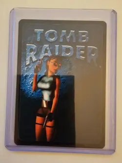 Tomb Raider CCG 223 - Dressed to Kill - Big Guns Promo Card, Ultra Rare+ - Image 2