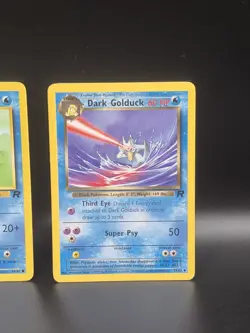 Team Rocket Psyduck Card 65/82 and Dark Golduck 37/82 Pokemon Cards - Image 2