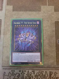 YUGIOH NUMBER 77: THE SEVEN SINS PGL3-EN011 GOLD SECRET 1ST ED NM - Image 1