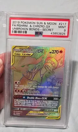 2019 POKEMON SUN & MOON UNBROKEN BONDS FULL ART/RESHIRAM & CHARIZARD GX PSA 9 - Image 1