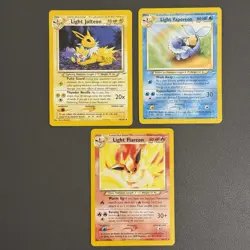 Pokemon Neo Destiny Eeveelutions Light Flareon Light Vaporeon Light Jolteon - Image 1