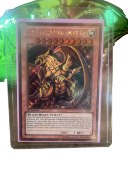 The Winged Dragon of Ra PGLD-EN031 Premium Gold 1st Edition gold secret rare - Image 2