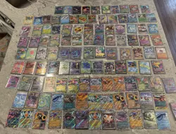 Pokemon Card Lot NM 100+ cards Charzard all in sleeves Storage unit find - Image 1