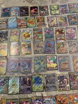 Pokemon Card Lot NM 100+ cards Charzard all in sleeves Storage unit find - Image 2