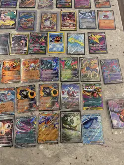 Pokemon Card Lot NM 100+ cards Charzard all in sleeves Storage unit find - Image 3