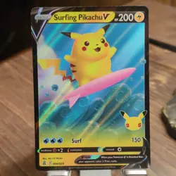 Pokemon Surfing Pikachu V Celebrations Holo 008/025 2021 English - Image 1