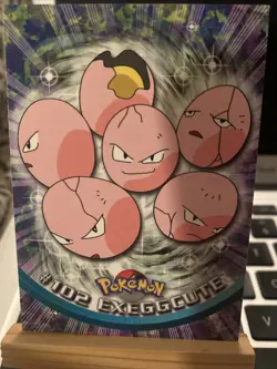 Exeggcute #102 Pokemon Topps Series 1 TCG Blue Logo Label 1st Print Pokemon - Image 1