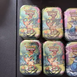 Pokemon Prismatic Evolutions Tin Lot Of 8 Sealed Tins - Image 2