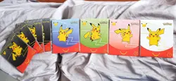 Pokemon 25th Anniversary McDonalds 2021 Promo Sealed Pack In Hand - Image 1