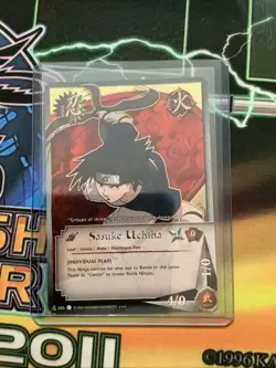 Naruto CCG Sasuke Uchiha holo super rare collectible card near mint or better - Image 1