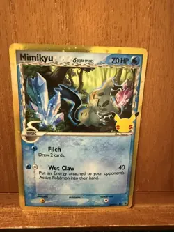 Pokemon Card Mimikyu SWSH136 Delta Species 25th Celebrations Black Star Promo - Image 1