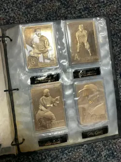 Binder of Danbury Mint 22kt Gold Cards - Image 1