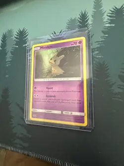 Mimikyu - SM29 BLACK STAR PROMO COSMOS HOLO FOIL 2017 Pokemon TCG - Image 1