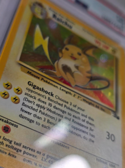 1999 POKEMON FOSSIL #14 RAICHU-HOLO PSA 7 - Image 3