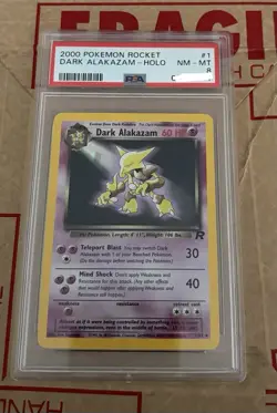 Pokemon TCG 2000 Team Rocket Dark Alakazam Holo PSA 8 1/82 Unlimited - Image 1