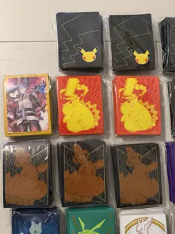 Pokemon Lot Of 23 Various ETB Card Sleeves Factory Sealed New - Image 2