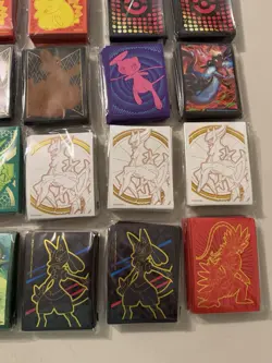 Pokemon Lot Of 23 Various ETB Card Sleeves Factory Sealed New - Image 4