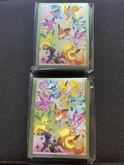 2 Eevee Card Sleeves From Pokemon Prismatic Evolutions SPC (65 Sleeves Total) - Image 1