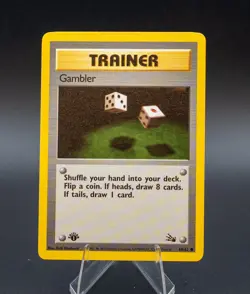 Trainer Gambler 1st Edition Pokemon Card Fossil Set 60/62 Common 1999 WOTC - Image 1