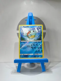 Squirtle 33/214 - Common Reverse Holo - Sun & Moon: Unbroken Bonds - Pokemon TC - Image 1