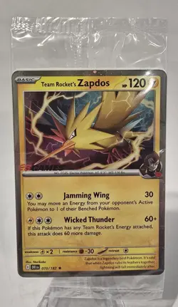 Team Rocket's Zapdos - 070/182 - EB Games Stamped Promo - Pokemon Card - SEALED - Image 1