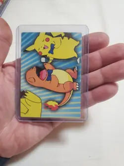 LP Pokemon Topps Series 3: Puzzle Card P06 of 6 (Charmander & Pikachu Singing) - Image 1