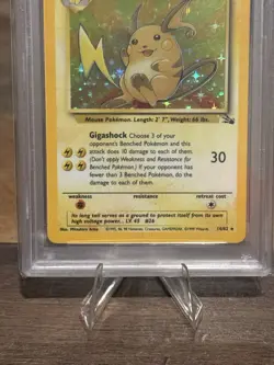 1999 Pokemon Fossil Raichu Holo 14/62 PSA 9 Mint WOTC Vintage Card - Image 3